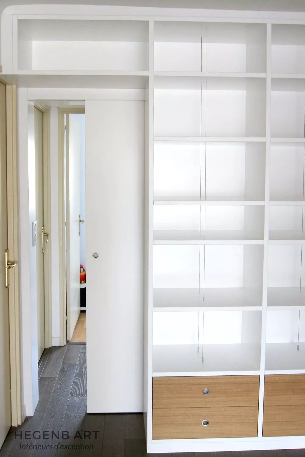 Double bookcase with sliding door – Hegenbart